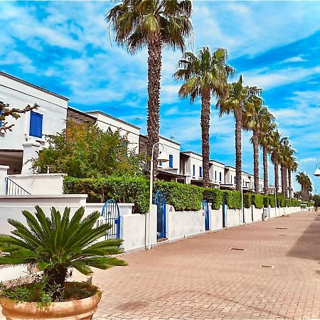 Villa In Villaggio Порто Чезарео Екстериор снимка