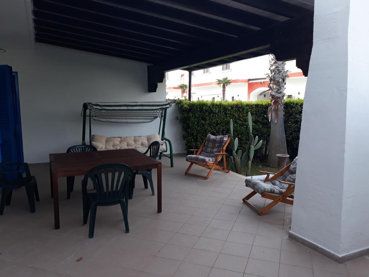 Villa In Villaggio Порто Чезарео Екстериор снимка