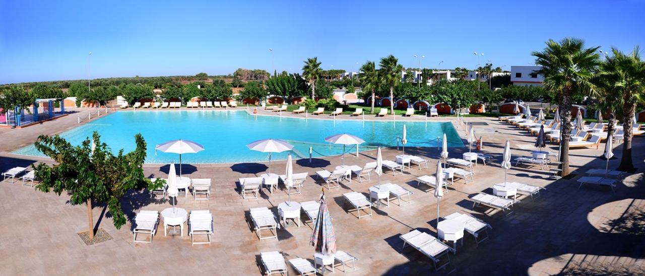 Villa In Villaggio Порто Чезарео Екстериор снимка