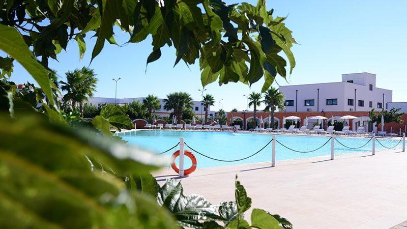Villa In Villaggio Порто Чезарео Екстериор снимка