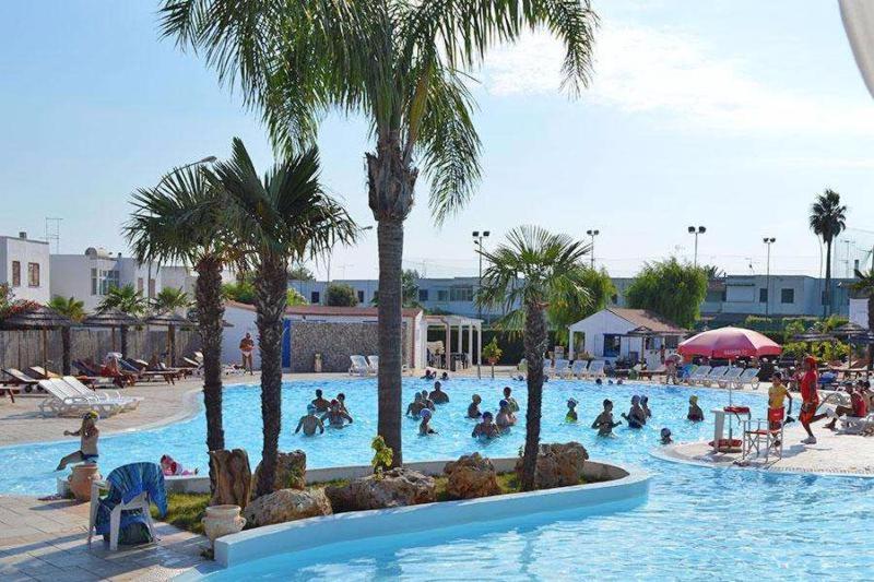 Villa In Villaggio Порто Чезарео Екстериор снимка